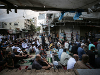 Palestinians are holding Eid al-Adha prayers in Bureij Refugee Camp in the central Gaza Strip, on June 16, 2024, amid the ongoing conflict b...