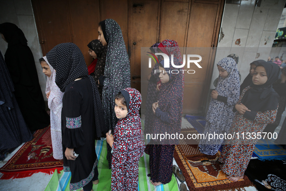 Palestinians are holding Eid al-Adha prayers in Bureij Refugee Camp in the central Gaza Strip, on June 16, 2024, amid the ongoing conflict b...