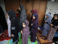 Palestinians are holding Eid al-Adha prayers in Bureij Refugee Camp in the central Gaza Strip, on June 16, 2024, amid the ongoing conflict b...