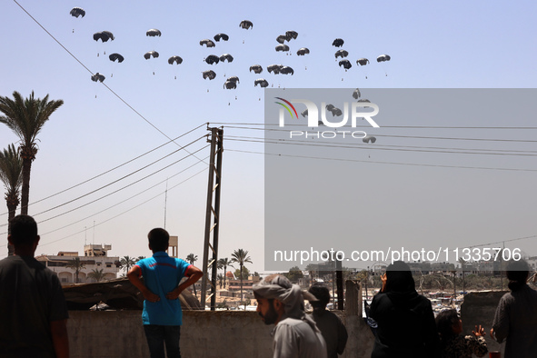 The Royal Jordanian Air Force is dropping humanitarian aid on Deir al-Balah in the central Gaza Strip on June 16, 2024, amid the ongoing con...