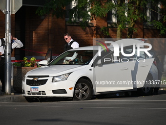 A 26-year-old male is being shot and killed on Father's Day while inside a vehicle in Chicago, Illinois, United States, on June 16, 2024. At...