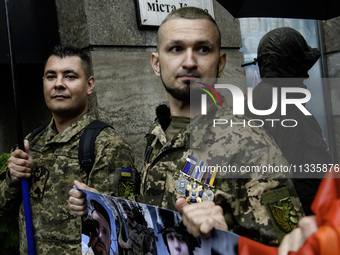 Ukrainian servicemen are taking part in the Equality March, organized by the LGBT+ community that is gathering for the first time since Russ...