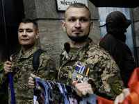 Ukrainian servicemen are taking part in the Equality March, organized by the LGBT+ community that is gathering for the first time since Russ...