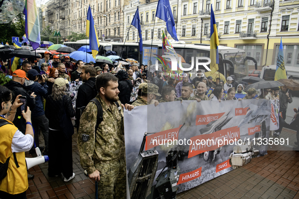 Ukrainian servicemen are taking part in the Equality March, organized by the LGBT+ community that is gathering for the first time since Russ...