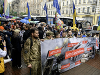 Ukrainian servicemen are taking part in the Equality March, organized by the LGBT+ community that is gathering for the first time since Russ...