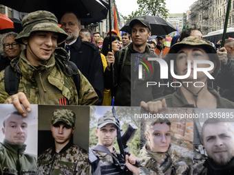 Ukrainian servicemen are taking part in the Equality March, organized by the LGBT+ community that is gathering for the first time since Russ...