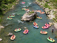 Tourists are experiencing canyon rafting cooling at Jiuwan River rafting scenic spot in Yichang, China, on June 15, 2024. Recently, many pla...