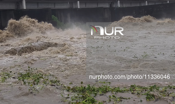 Water levels are rising in the Mahananda River and the Teesta Canal Fulbari near Siliguri, India, on June 16, 2024, due to heavy rainfall in...