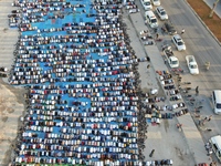 Muslims in Syria perform Eid al-Adha prayers in an open-air area in Bab al-Hawa Square, in the countryside of Idlib, northwest Syria, on the...