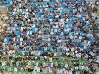 Muslims in Syria perform Eid al-Adha prayers in an open-air area in Bab al-Hawa Square, in the countryside of Idlib, northwest Syria, on the...