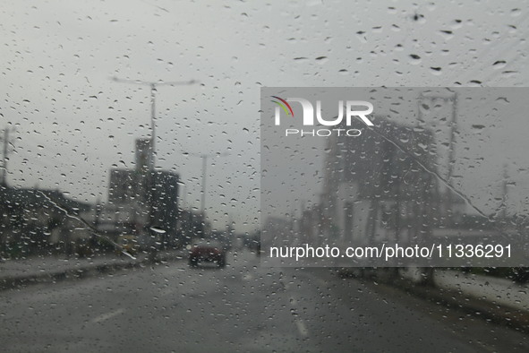 Rain droplets are covering a vehicle windscreen in Ogba, Ikeja, as the Muslim faithful are praying to mark the Eid-El-Kabir festival in Ikej...