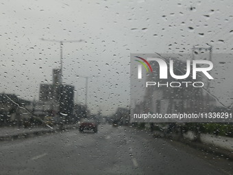 Rain droplets are covering a vehicle windscreen in Ogba, Ikeja, as the Muslim faithful are praying to mark the Eid-El-Kabir festival in Ikej...