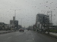 Rain droplets are covering a vehicle windscreen in Ogba, Ikeja, as the Muslim faithful are praying to mark the Eid-El-Kabir festival in Ikej...