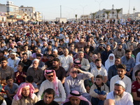 Muslims in Syria perform Eid al-Adha prayers in an open-air area in Bab al-Hawa Square, in the countryside of Idlib, northwest Syria, on the...