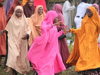 Female Muslims are showing excitement as Muslim faithful are praying to mark the Eid-El-Kabir festival in Ikeja, Lagos, Nigeria, on Sunday,...