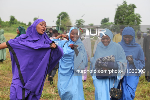 Female Muslims are showing excitement as Muslim faithful are praying to mark the Eid-El-Kabir festival in Ikeja, Lagos, Nigeria, on Sunday,...