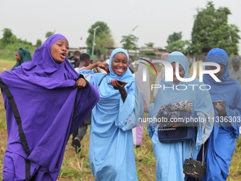 Female Muslims are showing excitement as Muslim faithful are praying to mark the Eid-El-Kabir festival in Ikeja, Lagos, Nigeria, on Sunday,...