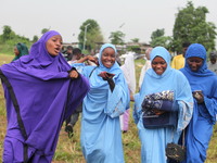 Female Muslims are showing excitement as Muslim faithful are praying to mark the Eid-El-Kabir festival in Ikeja, Lagos, Nigeria, on Sunday,...