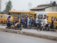 Commercial motorcyclists are awaiting passengers as Muslim faithful are praying to mark the Eid-El-Kabir festival in Ikeja, Lagos, Nigeria,...