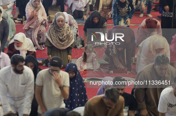 In the center, a girl from the Muslim community in Mexico City, Mexico, on the occasion of the celebration of Eid al-Adha (Feast of Sacrific...