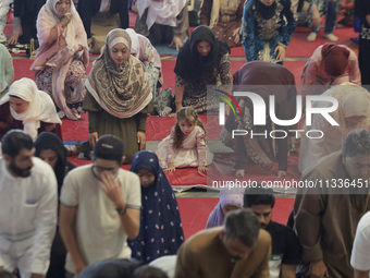 In the center, a girl from the Muslim community in Mexico City, Mexico, on the occasion of the celebration of Eid al-Adha (Feast of Sacrific...