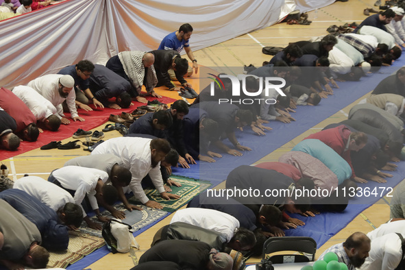 Members of the Muslim community in Mexico City, Mexico, are praying inside the facilities of the Plan Sexenal on the occasion of the celebra...