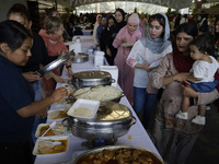 Members of the Muslim community in Mexico City, Mexico, on Eid al-Adha, are breaking their fast inside the facilities of the Plan Sexenal to...