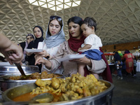 Members of the Muslim community in Mexico City, Mexico, on Eid al-Adha, are breaking their fast inside the facilities of the Plan Sexenal to...