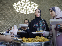 Members of the Muslim community in Mexico City, Mexico, on Eid al-Adha, are breaking their fast inside the facilities of the Plan Sexenal to...