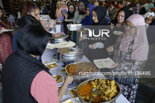 Members of the Muslim community in Mexico City, Mexico, on Eid al-Adha, are breaking their fast inside the facilities of the Plan Sexenal to...