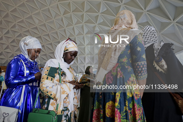 Members of the Muslim community in Mexico City, Mexico, on Eid al-Adha, are breaking their fast inside the facilities of the Plan Sexenal to...