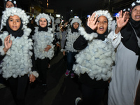 Hundreds of children are dressing as sheep during a lantern parade to celebrate Eid al-Adha on the city streets in Malang, East Java, Indone...