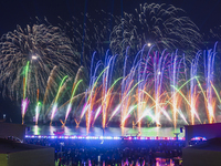 Fireworks are lighting up the sky over Katara Cultural Village during the celebration of the first day of the Eid Al-Adha festival in Doha,...