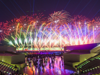 Fireworks are lighting up the sky over Katara Cultural Village during the celebration of the first day of the Eid Al-Adha festival in Doha,...