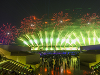 Fireworks are lighting up the sky over Katara Cultural Village during the celebration of the first day of the Eid Al-Adha festival in Doha,...