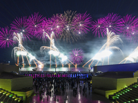 Fireworks are lighting up the sky over Katara Cultural Village during the celebration of the first day of the Eid Al-Adha festival in Doha,...