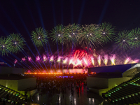 Fireworks are lighting up the sky over Katara Cultural Village during the celebration of the first day of the Eid Al-Adha festival in Doha,...