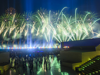 Fireworks are lighting up the sky over Katara Cultural Village during the celebration of the first day of the Eid Al-Adha festival in Doha,...