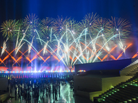 Fireworks are lighting up the sky over Katara Cultural Village during the celebration of the first day of the Eid Al-Adha festival in Doha,...