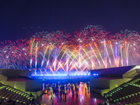 Fireworks are lighting up the sky over Katara Cultural Village during the celebration of the first day of the Eid Al-Adha festival in Doha,...