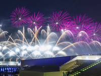 Fireworks are lighting up the sky over Katara Cultural Village during the celebration of the first day of the Eid Al-Adha festival in Doha,...