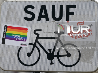 CAEN, FRANCE - JUNE 16: 
One of the many road signs adorned with stickers left by participants of the 2024 Pride Parade in the Caen city cen...