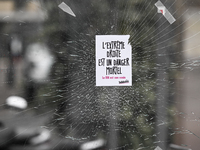 CAEN, FRANCE - JUNE 16: 
A message-sticker left on a vandalized shop window by participants of the 2024 Pride Parade in Caen city center, se...