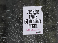 CAEN, FRANCE - JUNE 16: 
A message-sticker left on a vandalized shop window by participants of the 2024 Pride Parade in Caen city center, se...