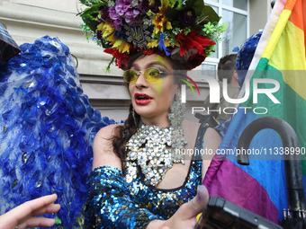 An activist is partaking in the Equality March organized by KyivPride NGO for the first time since the 2022 Russian invasion of Ukraine, in...