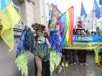 An activist is partaking in the Equality March organized by KyivPride NGO for the first time since the 2022 Russian invasion of Ukraine, in...