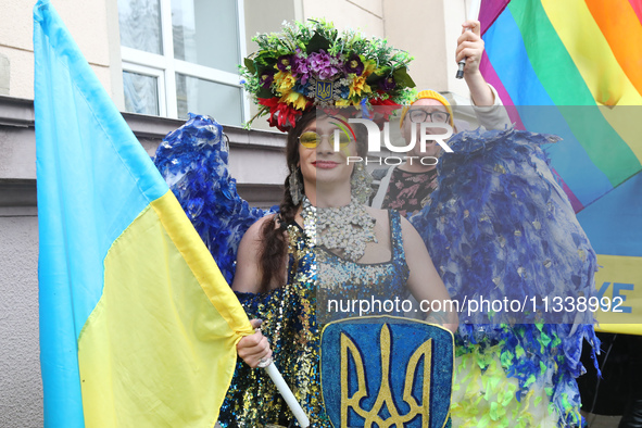 An activist is partaking in the Equality March organized by KyivPride NGO for the first time since the 2022 Russian invasion of Ukraine, in...