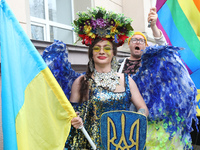 An activist is partaking in the Equality March organized by KyivPride NGO for the first time since the 2022 Russian invasion of Ukraine, in...