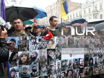 Activists in military uniforms are partaking in the Equality March organized by KyivPride NGO for the first time since the 2022 Russian inva...