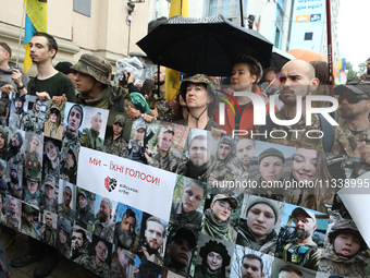 Activists in military uniforms are partaking in the Equality March organized by KyivPride NGO for the first time since the 2022 Russian inva...